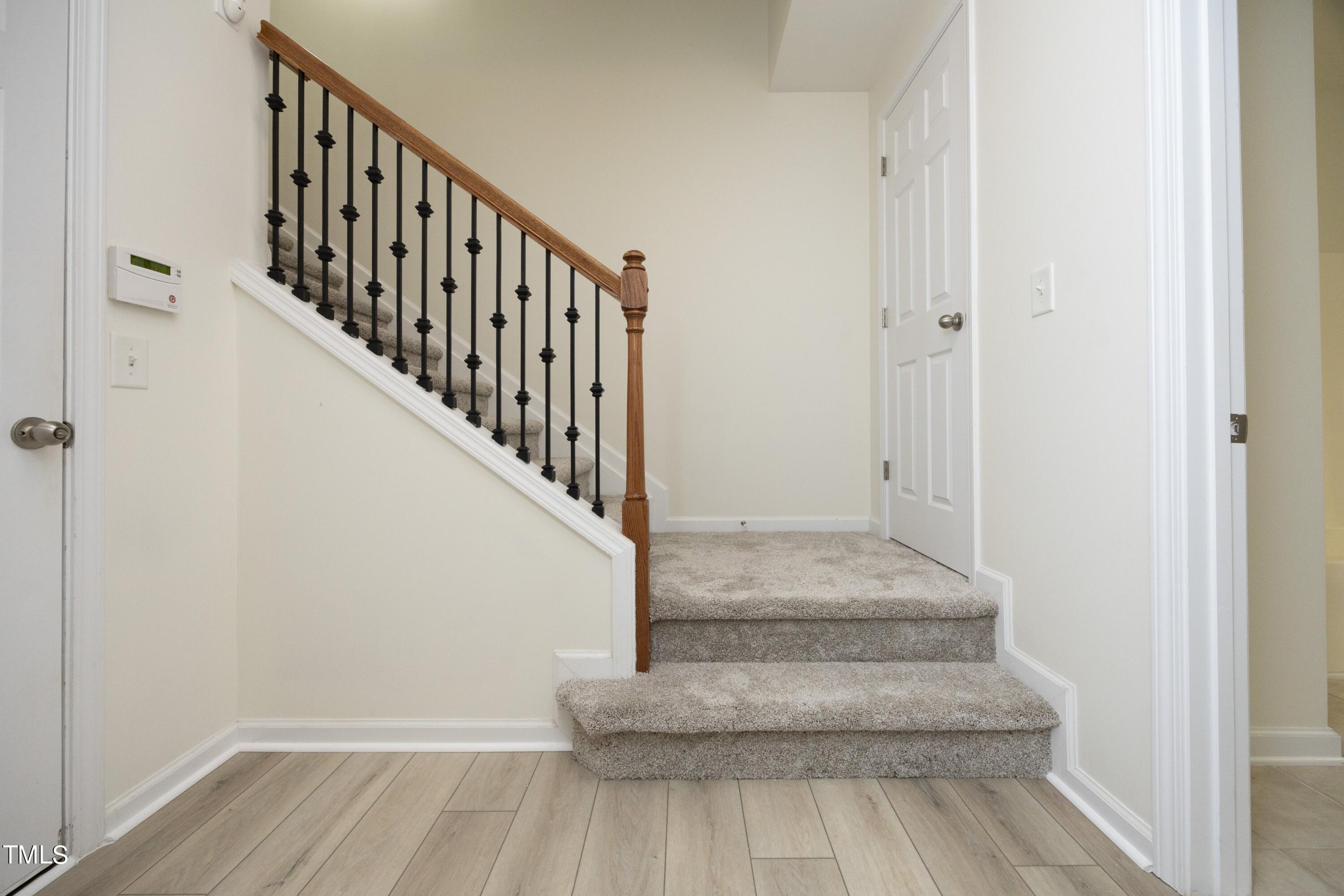 2502 Silverpalm Street Raleigh, NC 27612 - Photo 22 of 29 Staircase to Main Floor