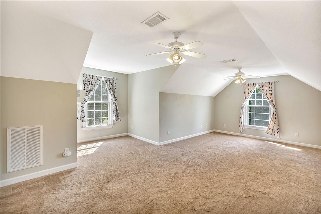 3620 Centerville Road Anderson, SC 29625 - Photo 41 of 49 Angled ceilings and soft carpeting define this spacious upper-level bonus room.