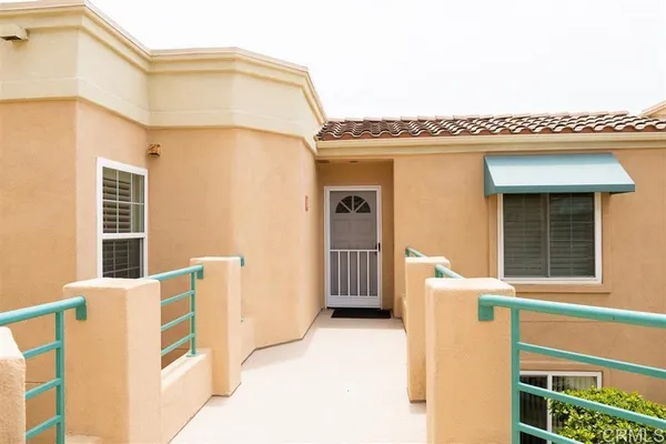 a front view of a house with a garage
