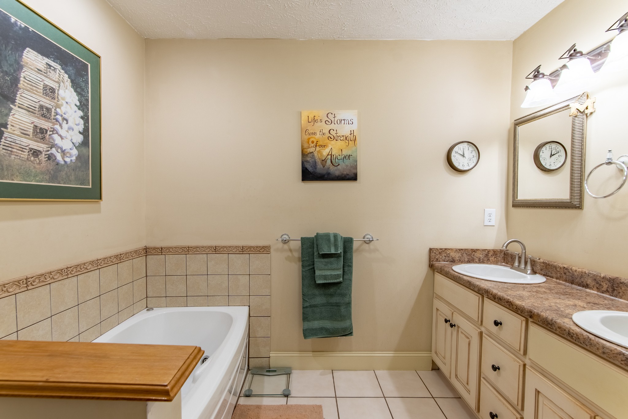 115 Tanyard Circle Adamsville, TN 38310 - Photo 18 of 52 a bathroom with a sink a toilet and a mirror