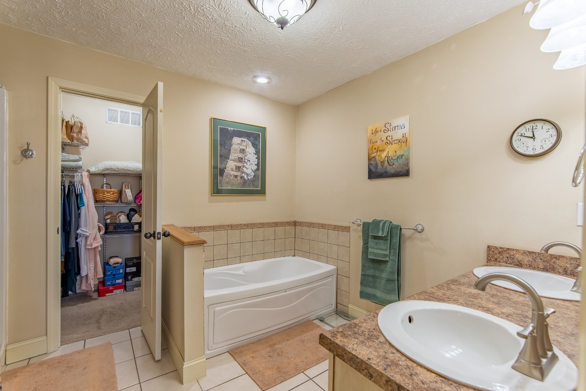 115 Tanyard Circle Adamsville, TN 38310 - Photo 19 of 52 a bathroom with a sink a bathtub and a toilet