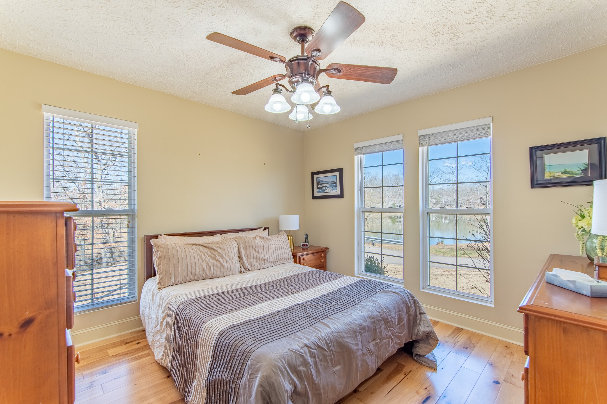 115 Tanyard Circle Adamsville, TN 38310 - Photo 22 of 52 a bedroom with a large bed and a window