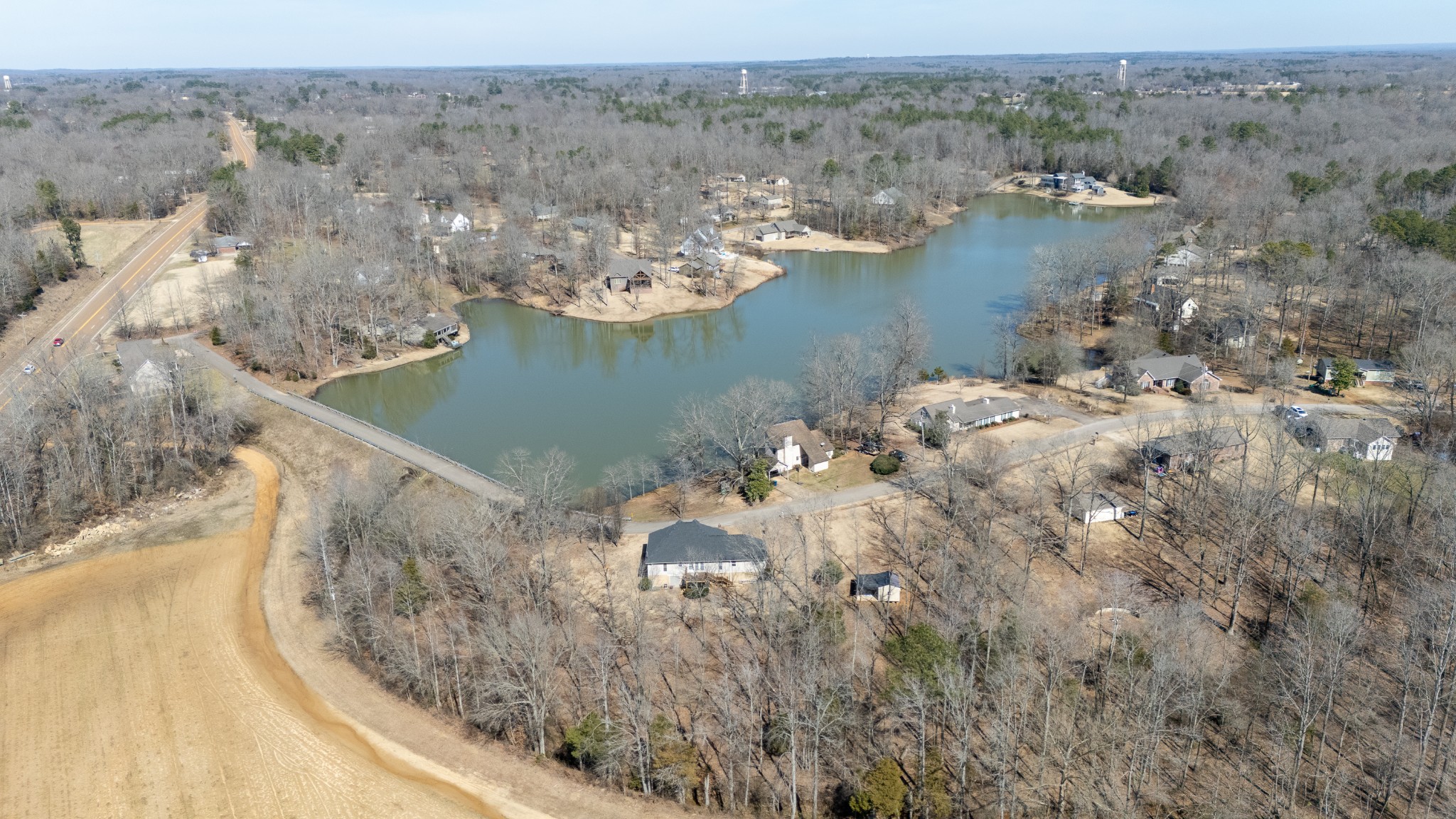 115 Tanyard Circle Adamsville, TN 38310 - Photo 43 of 52 an aerial view of a house with a lake view