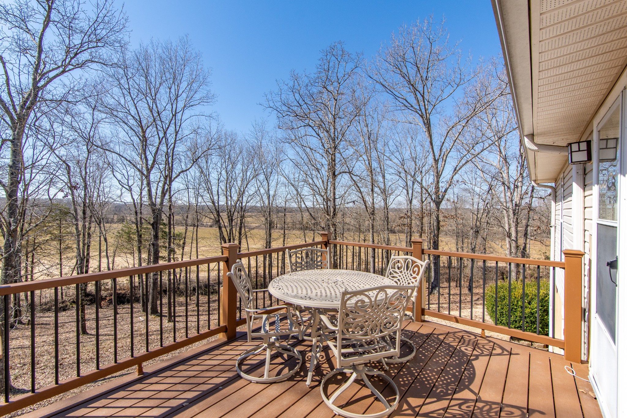 115 Tanyard Circle Adamsville, TN 38310 - Photo 49 of 52 a view of a chairs and table on the roof deck