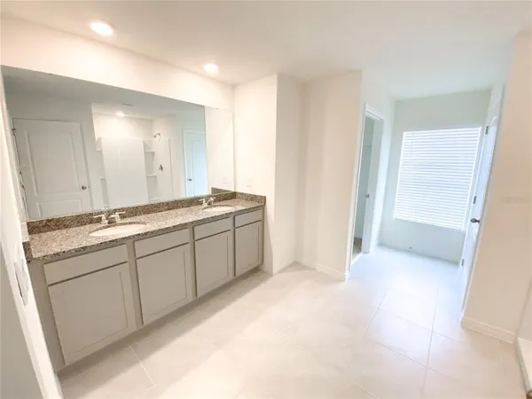 a view of a room with white door