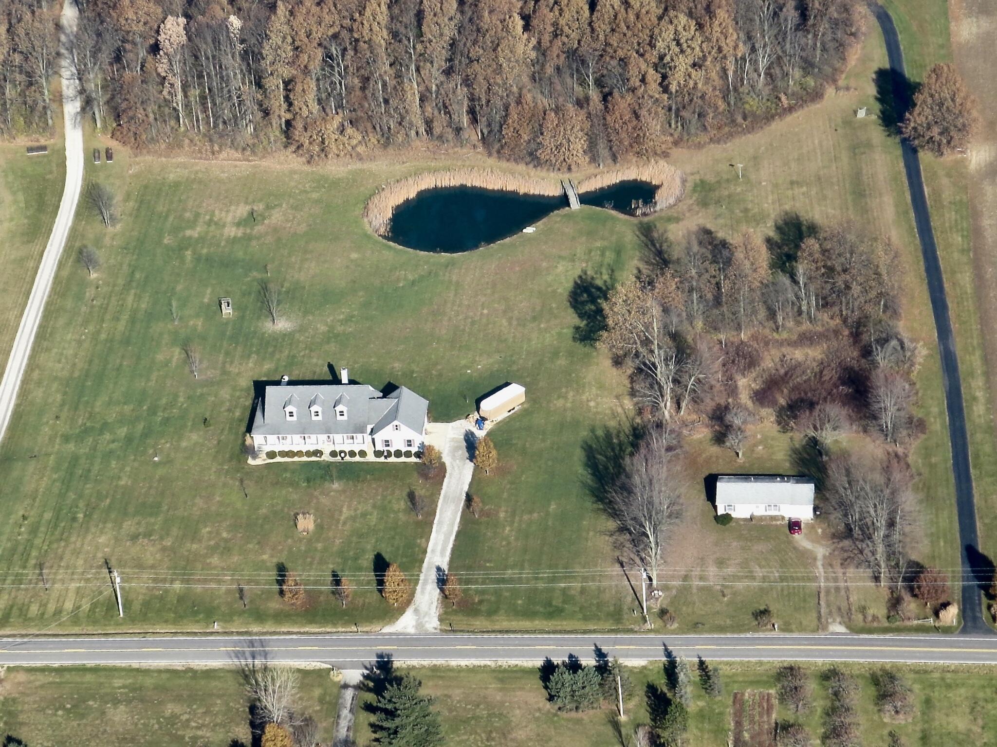 3680 Warrensburg Road Delaware, OH 43015 - Photo 3 of 46 Aerial view showing pond and woods