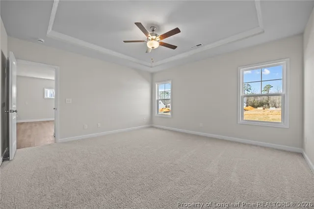 a living room with a fireplace and a window