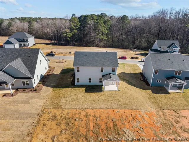 a view of a lake with couches and city view