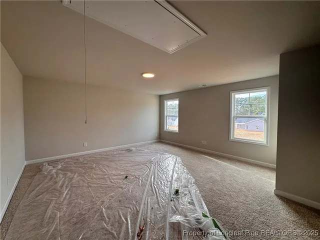 a view of bedroom with window