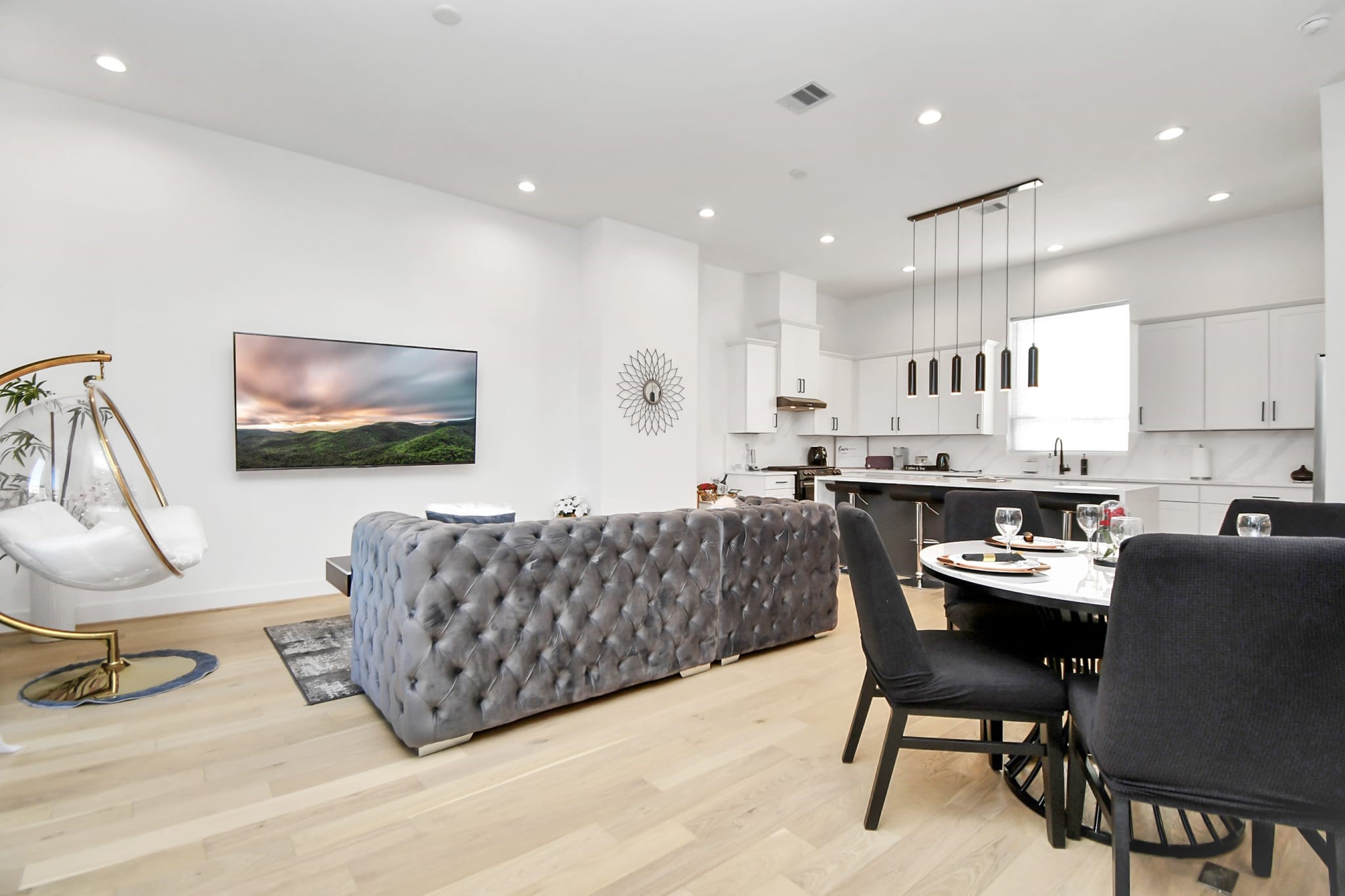 1104 Palmer Street Houston, TX 77003 - Photo 40 of 40 a dining room with furniture and a flat screen tv