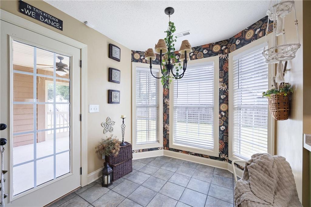 6 Keystone Lane Northeast Rome, GA 30161 - Photo 13 of 26 a view of entryway with a chandelier