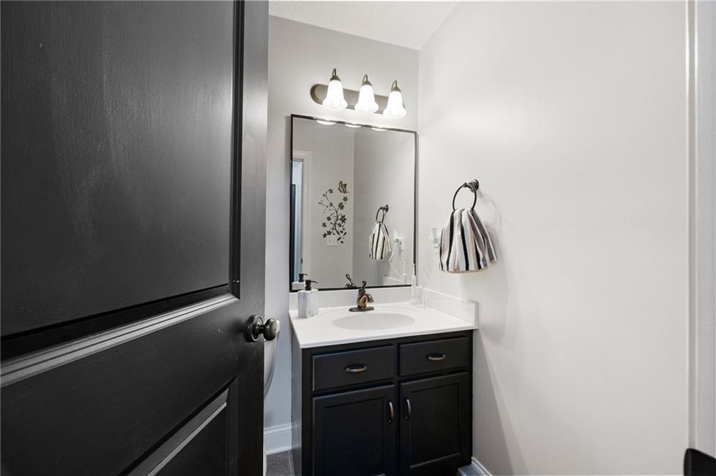 6 Keystone Lane Northeast Rome, GA 30161 - Photo 16 of 26 a bathroom with a sink and a mirror