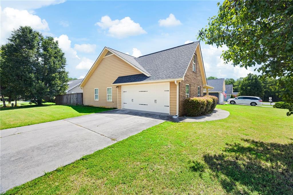 6 Keystone Lane Northeast Rome, GA 30161 - Photo 3 of 26 a house view with a garden space