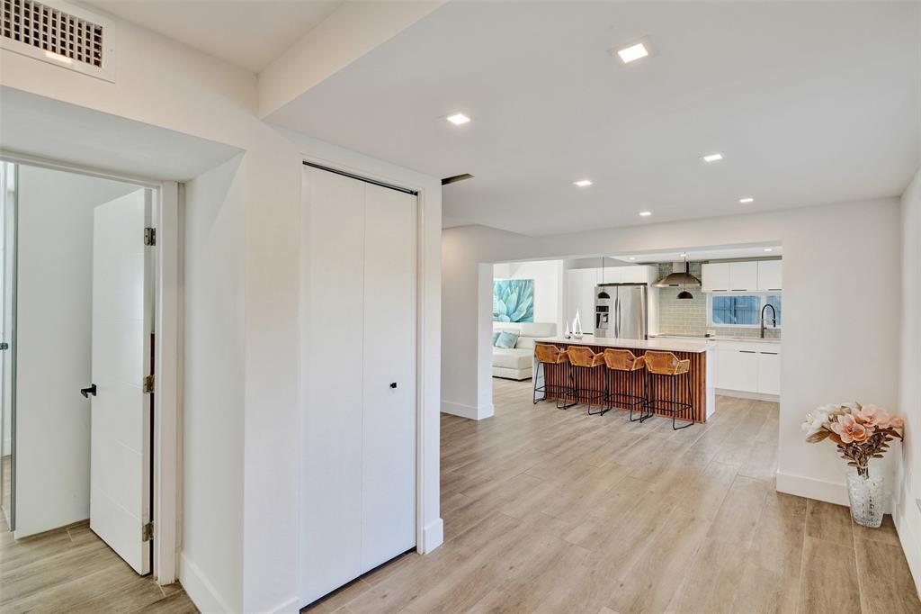 701 Northeast 164th Street Miami, FL 33162 - Photo 20 of 52 a view of work space with wooden floor and furniture