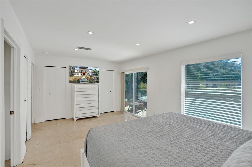 701 Northeast 164th Street Miami, FL 33162 - Photo 29 of 52 a view of an empty room with a window