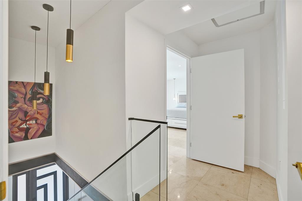 701 Northeast 164th Street Miami, FL 33162 - Photo 41 of 52 a view of hallway with stairs