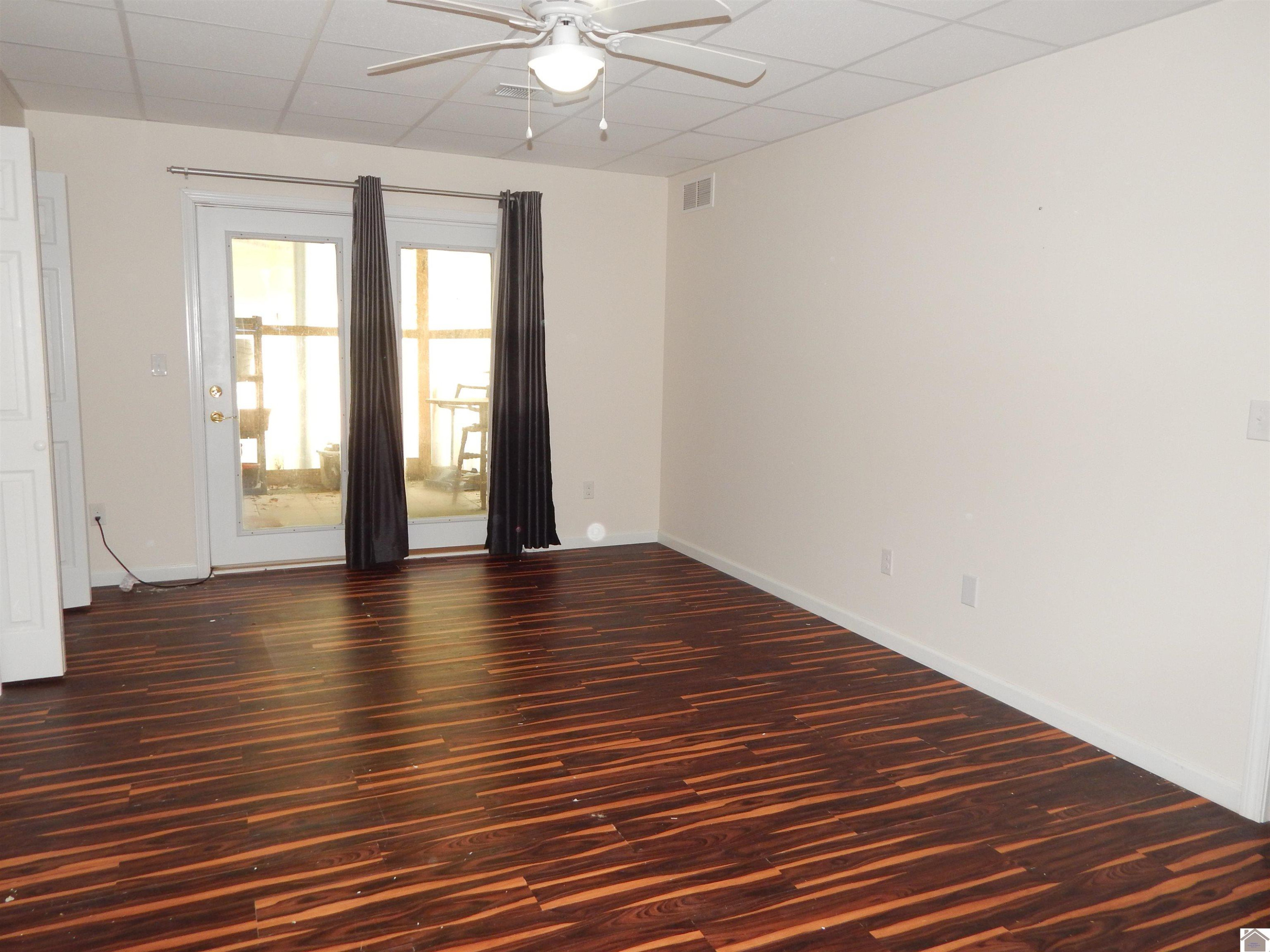 283 Delaware Road Gilbertsville, KY 42044 - Photo 18 of 35 DOWNSTAIRS LEFT BEDROOM