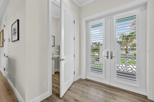 a kitchen with stainless steel appliances granite countertop a sink and a stove