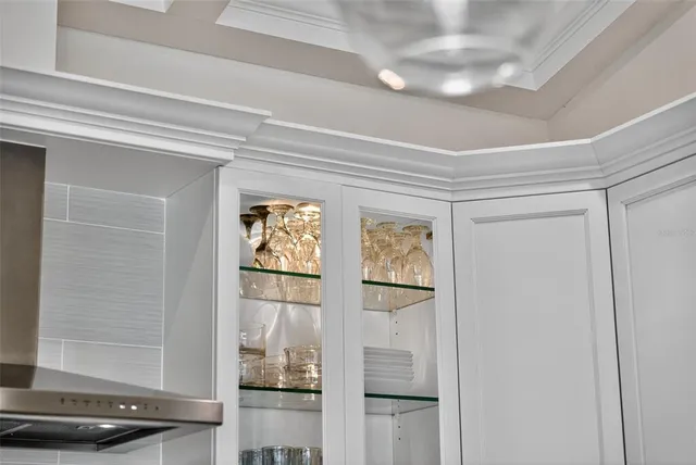 a view of a porch with wooden floor and stairs