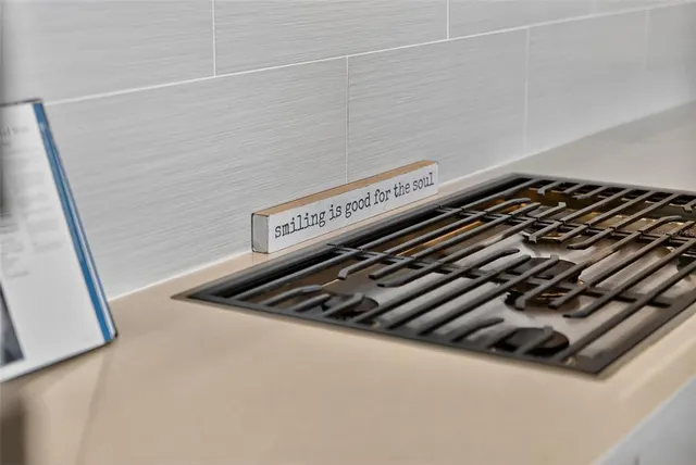 a bedroom with a bed and a lamp