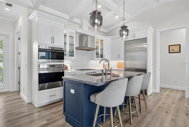 a bathroom with a toilet a sink and shower