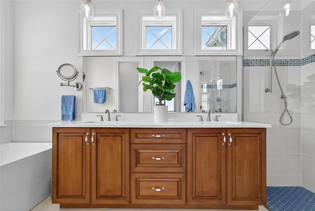 a sign of golf club on a wall under a tree