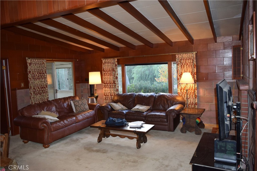 41329 Gibbel Road Hemet, CA 92544 - Photo 11 of 30 a living room with furniture and a large window