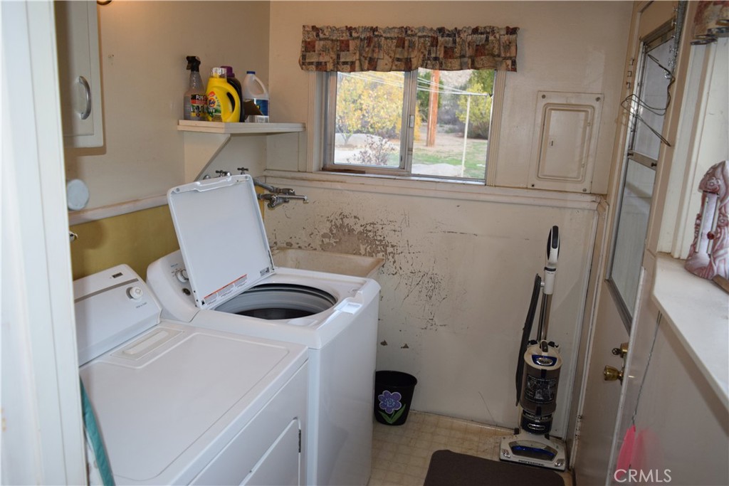 41329 Gibbel Road Hemet, CA 92544 - Photo 14 of 30 a bathroom with a sink and a window