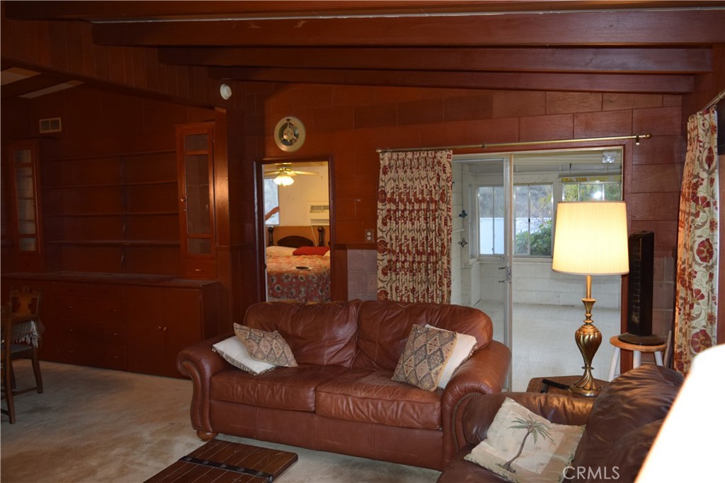 41329 Gibbel Road Hemet, CA 92544 - Photo 19 of 30 a living room with furniture and a lamp
