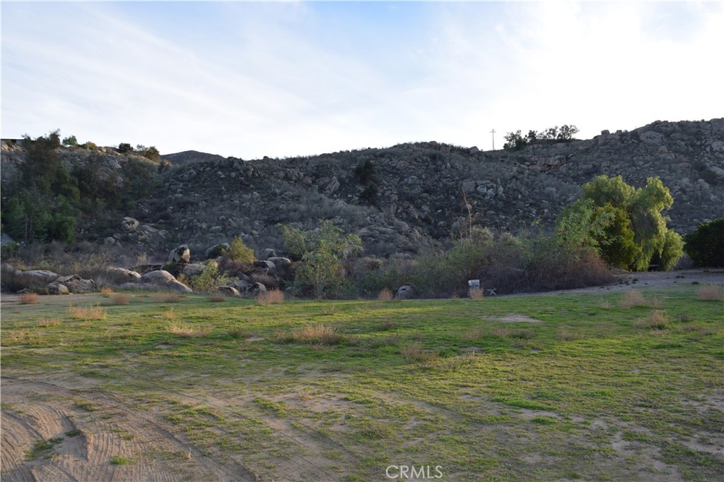 41329 Gibbel Road Hemet, CA 92544 - Photo 22 of 30 a view of a grassy area with an ocean