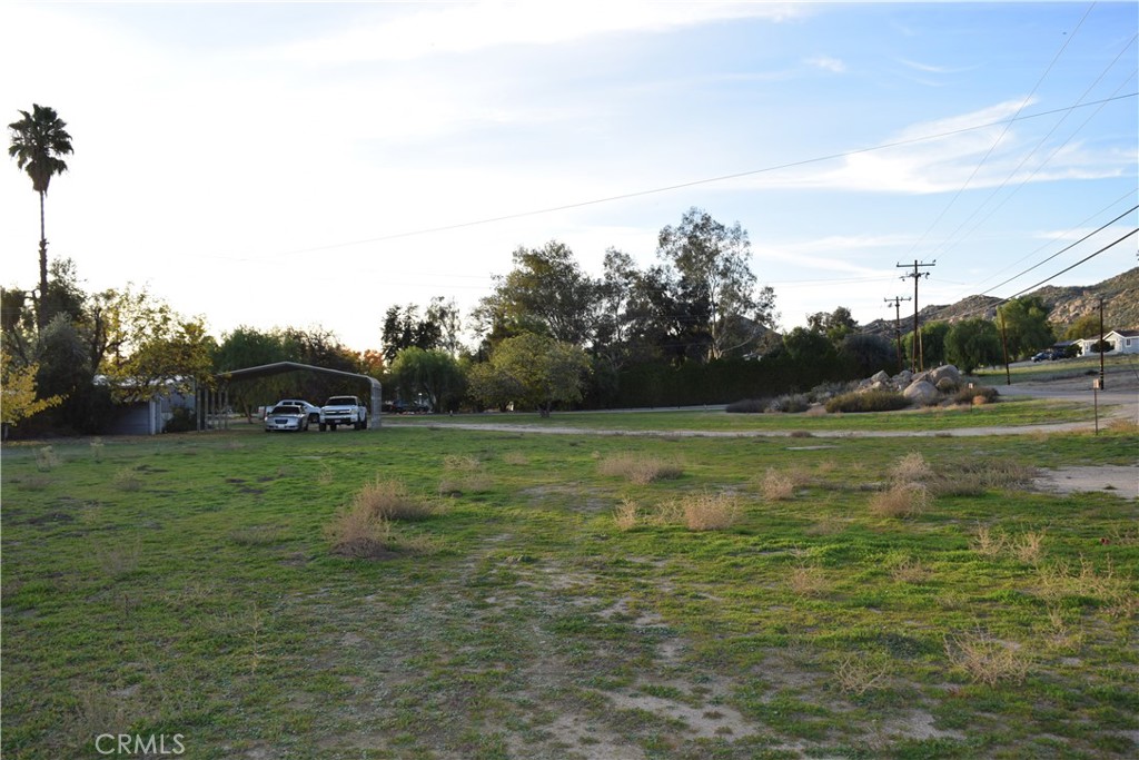 41329 Gibbel Road Hemet, CA 92544 - Photo 24 of 30 a view of a green field with wooden fence