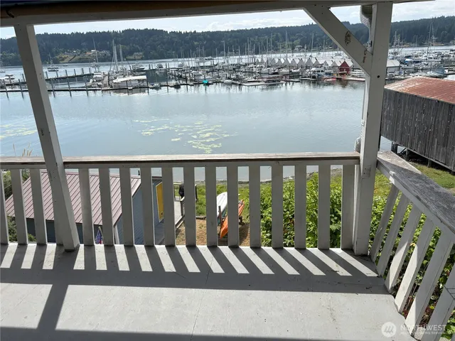 a view of wooden floor with lake view
