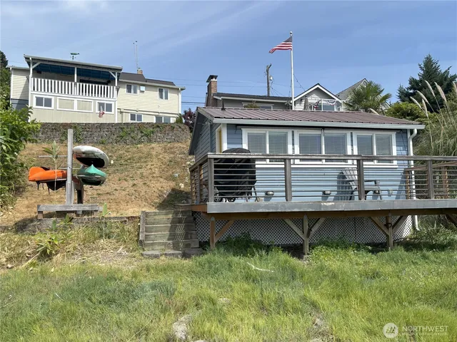 an aerial view of a house with swimming pool