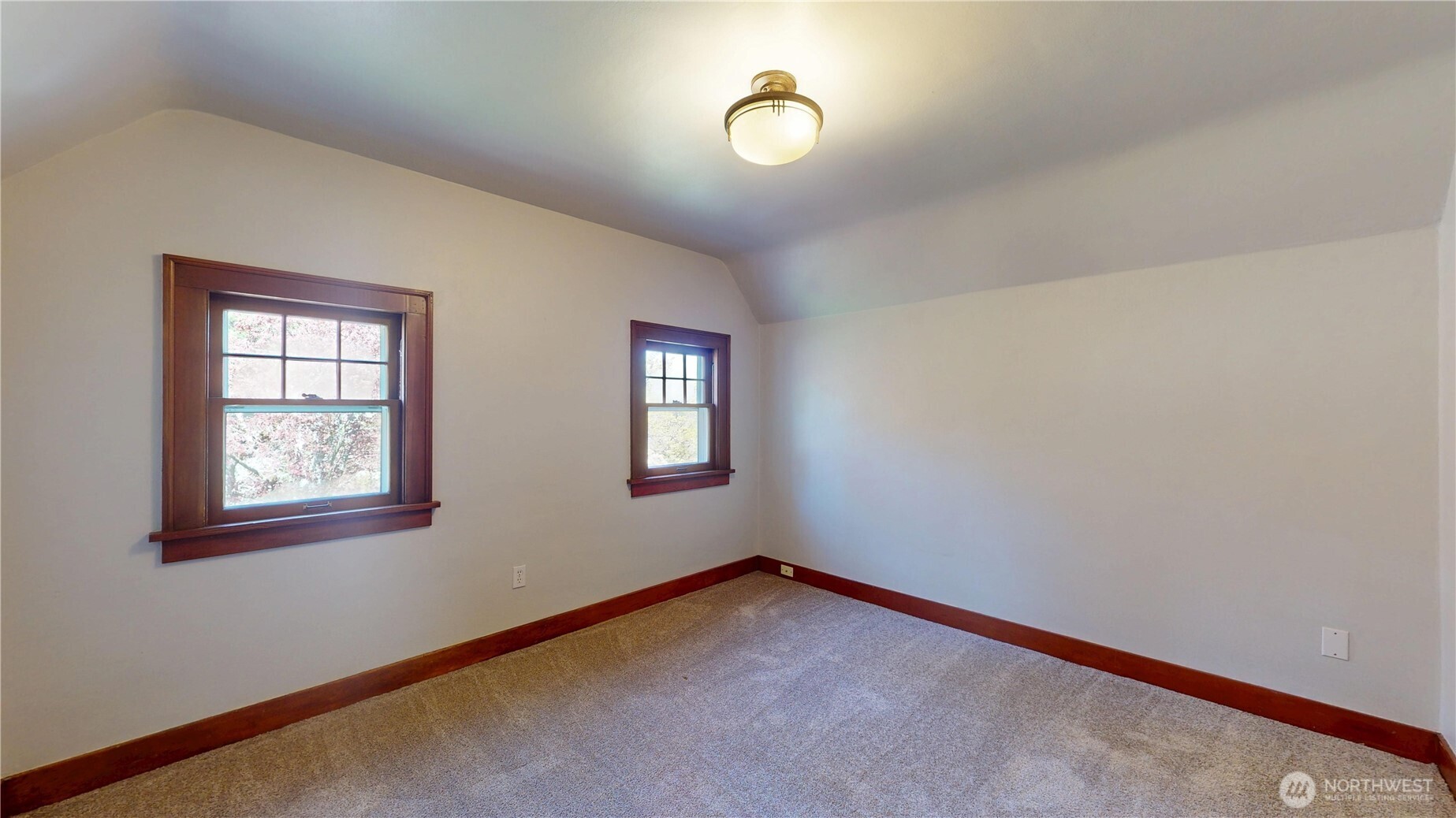 1533 Northeast Tagholm Road Poulsbo, WA 98370 - Photo 22 of 40 a view of empty room with windows