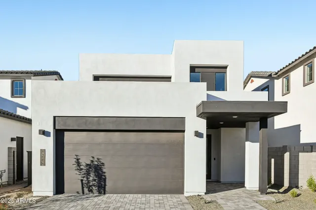 a view of a house with large windows
