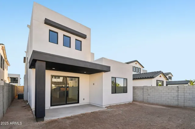 a front view of a house with a garage