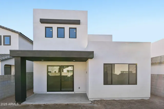 a front view of a house with a doors