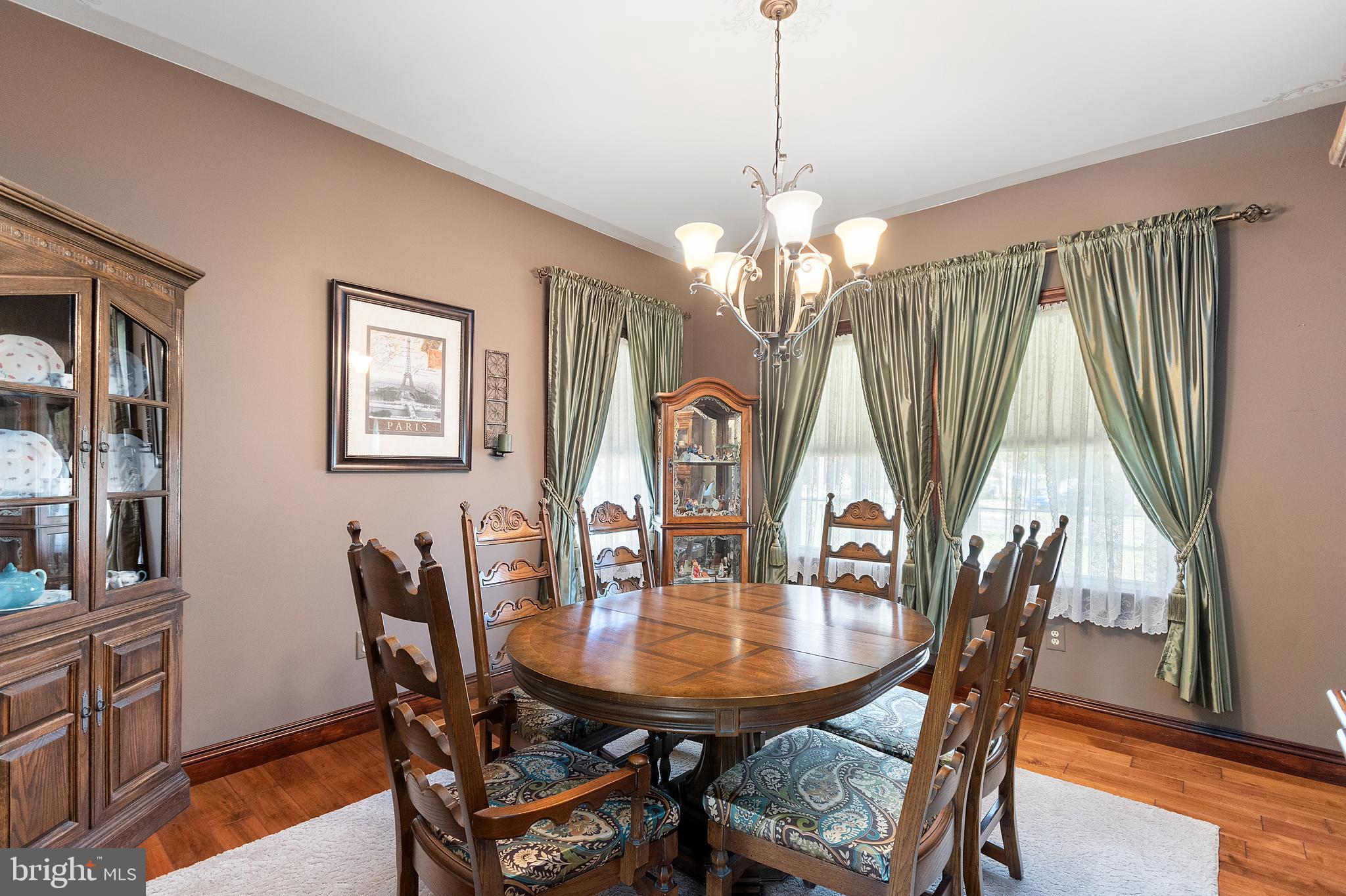 487 Radix Road Williamstown, NJ 08094 - Photo 12 of 36 a view of a dining room with furniture window and wooden floor