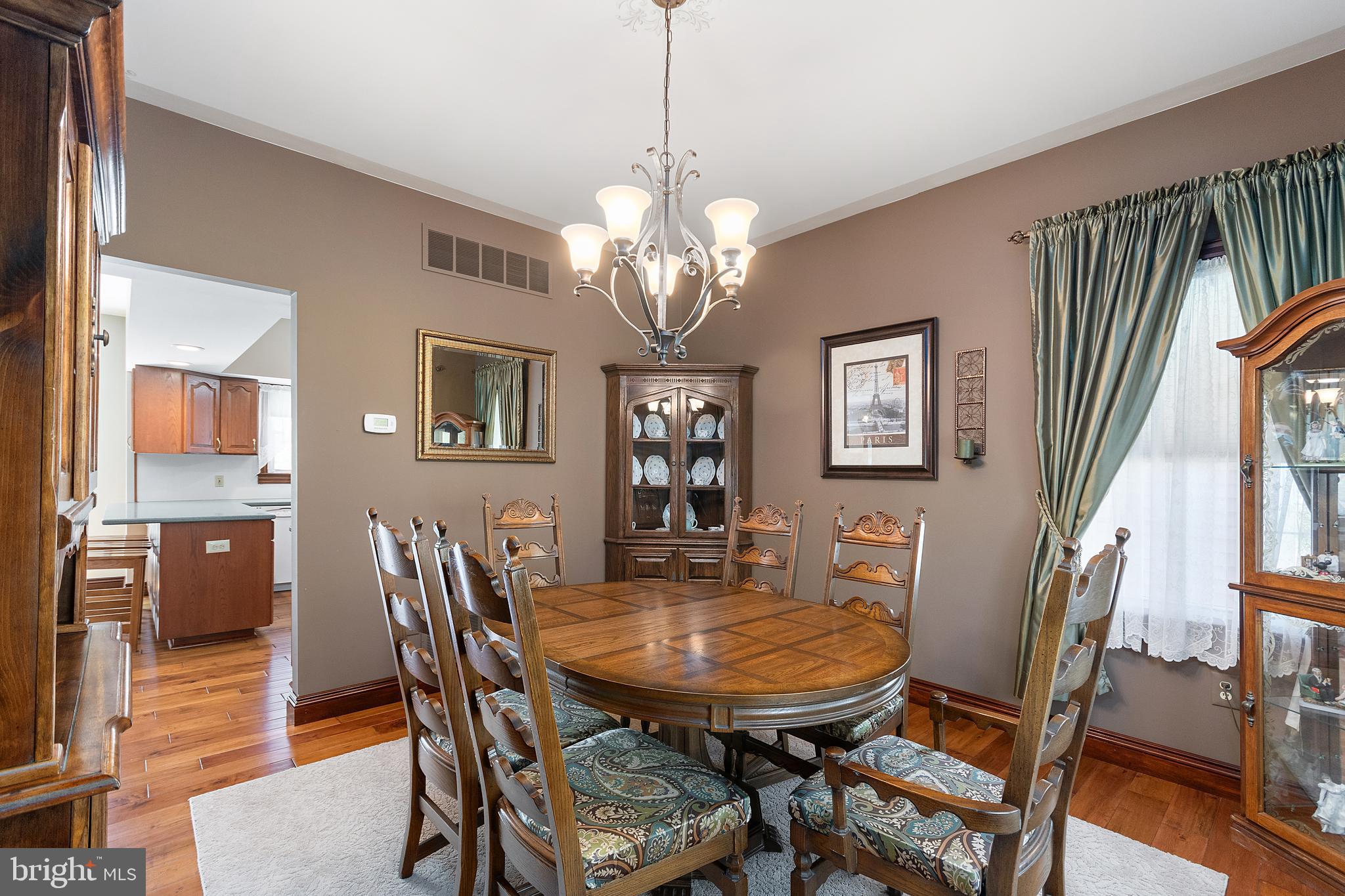 487 Radix Road Williamstown, NJ 08094 - Photo 13 of 36 a view of a dining room with furniture and wooden floor