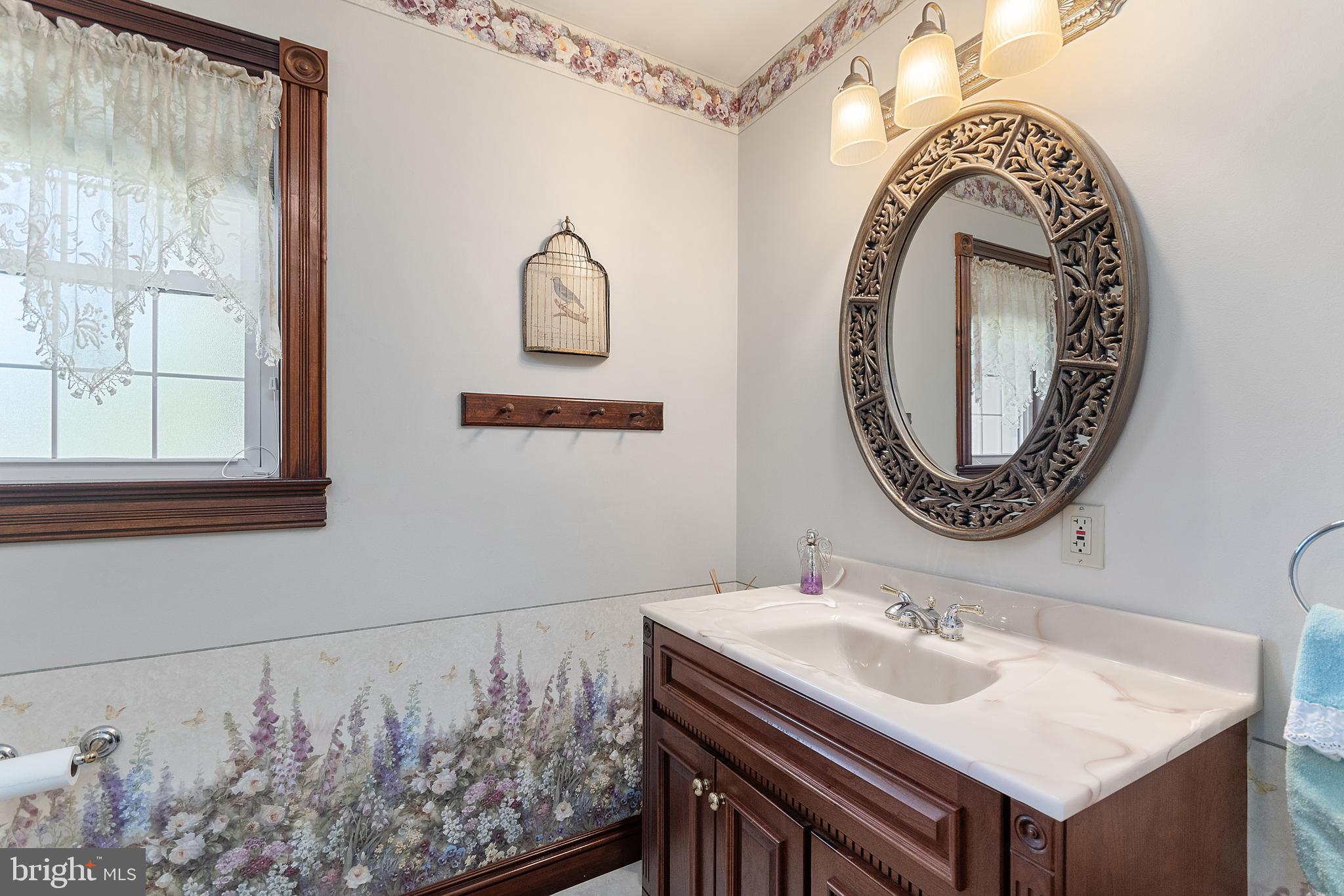 487 Radix Road Williamstown, NJ 08094 - Photo 16 of 36 a bathroom with a sink and a mirror