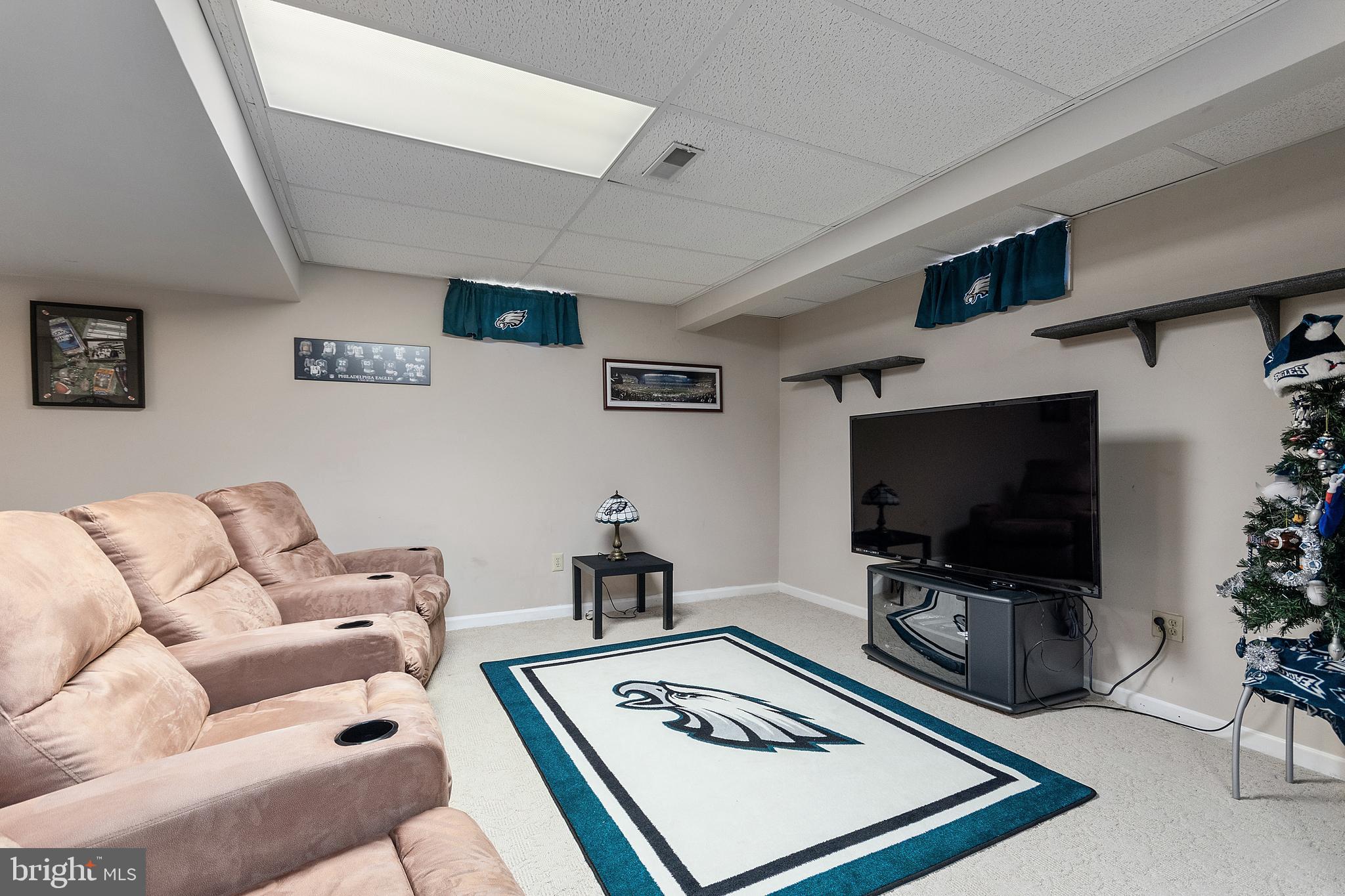 487 Radix Road Williamstown, NJ 08094 - Photo 27 of 36 a living room with furniture and a flat screen tv