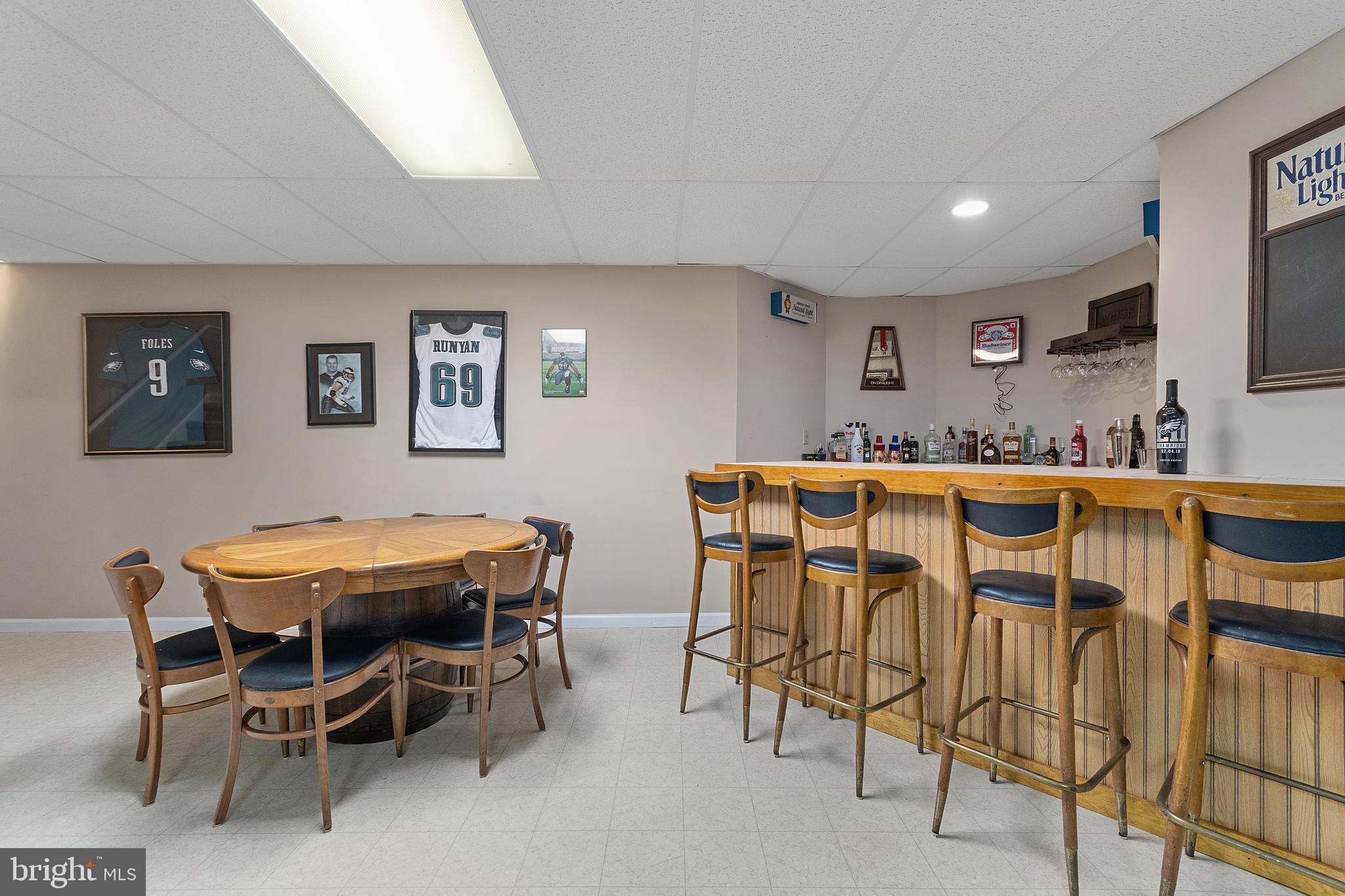 487 Radix Road Williamstown, NJ 08094 - Photo 31 of 36 a dining room with furniture and a flat screen tv