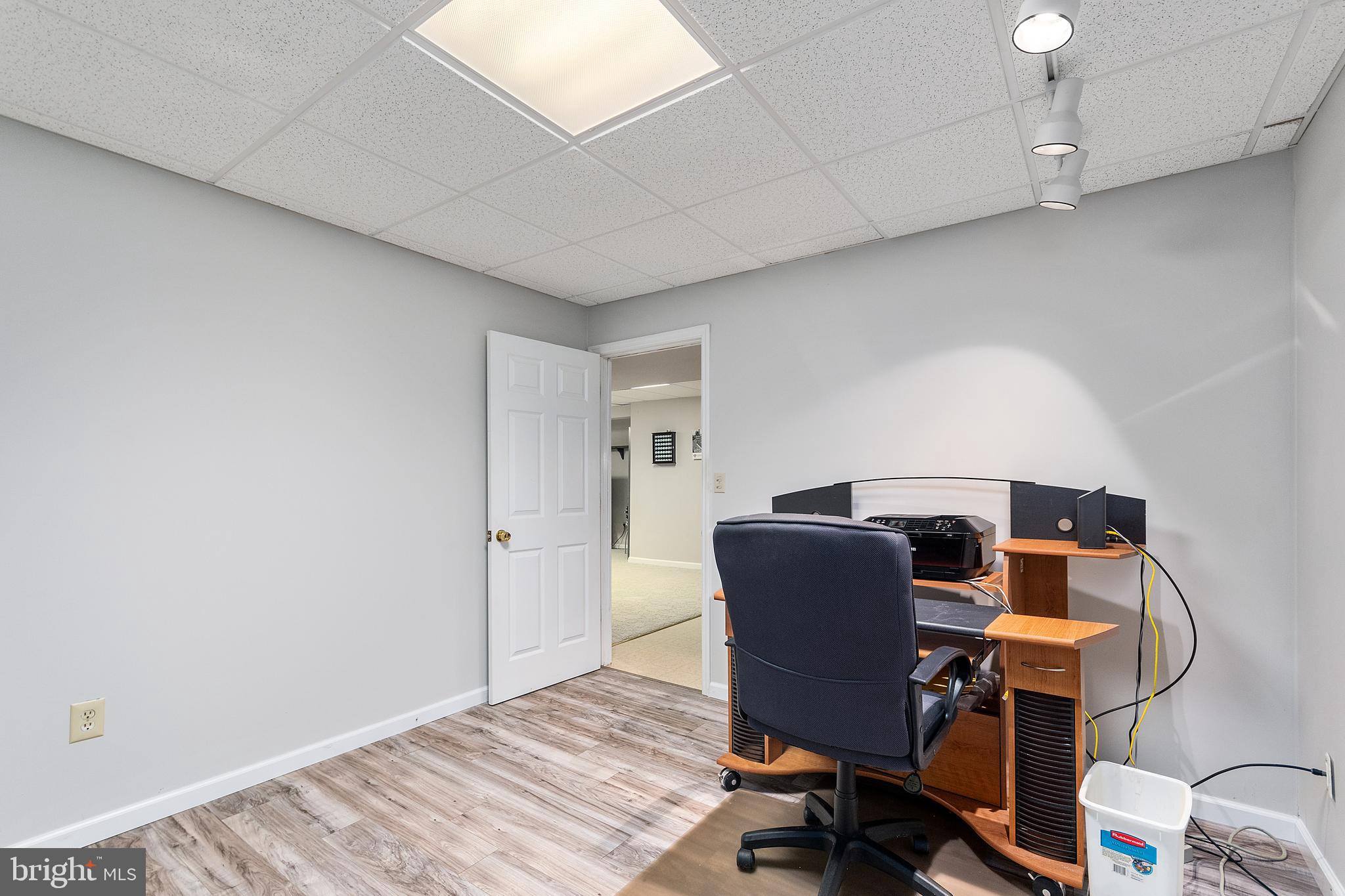 487 Radix Road Williamstown, NJ 08094 - Photo 32 of 36 a view of a workspace with furniture and wooden floor