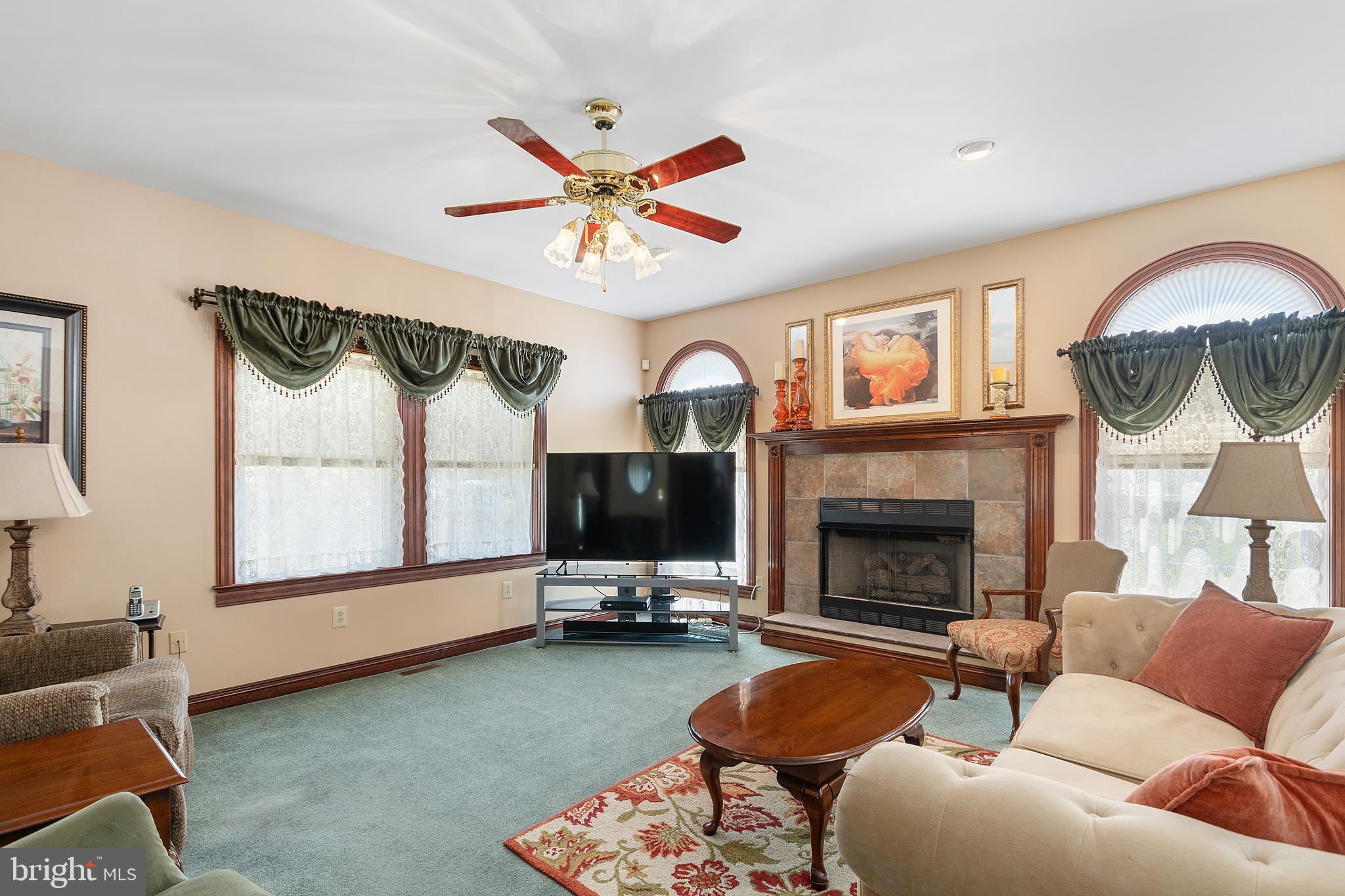 487 Radix Road Williamstown, NJ 08094 - Photo 5 of 36 a living room with furniture and a fireplace