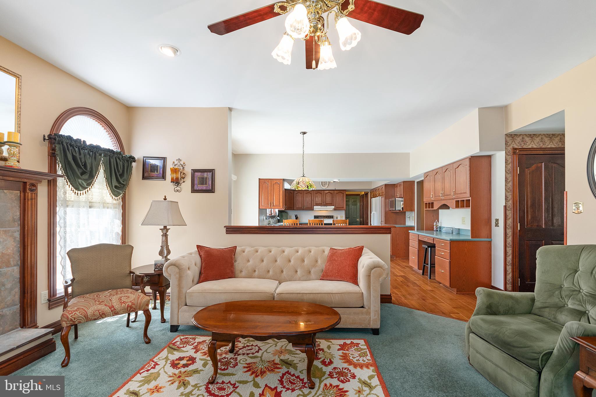 487 Radix Road Williamstown, NJ 08094 - Photo 6 of 36 a living room with furniture and a chandelier