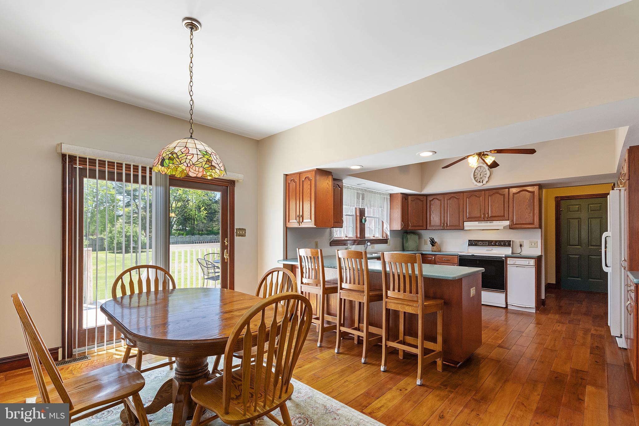 487 Radix Road Williamstown, NJ 08094 - Photo 7 of 36 a view of a dining room with furniture window and wooden floor