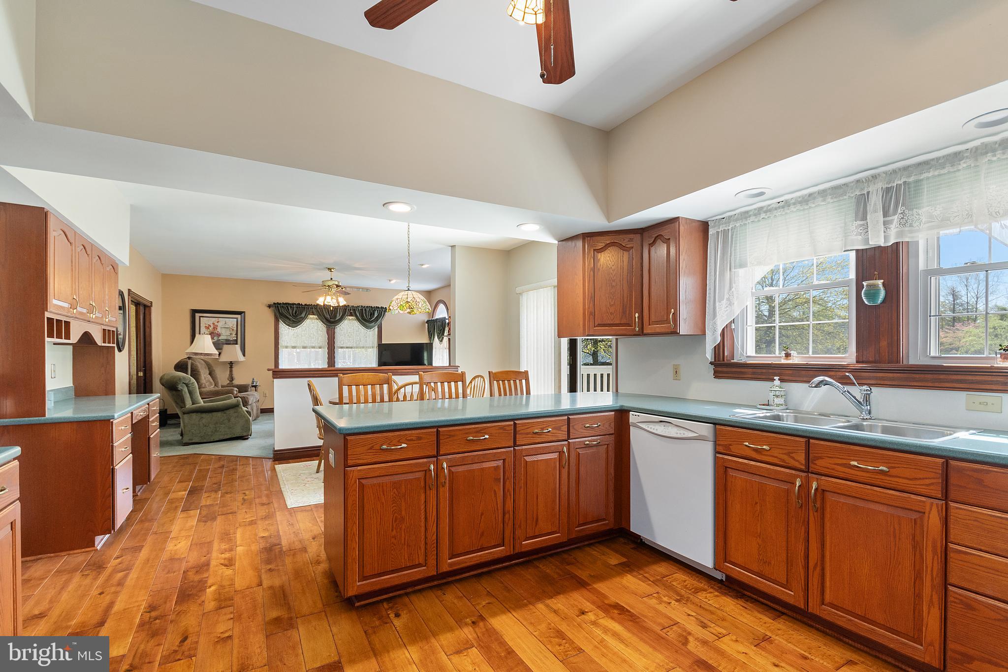487 Radix Road Williamstown, NJ 08094 - Photo 10 of 36 a kitchen with lots of counter top space and stainless steel appliances