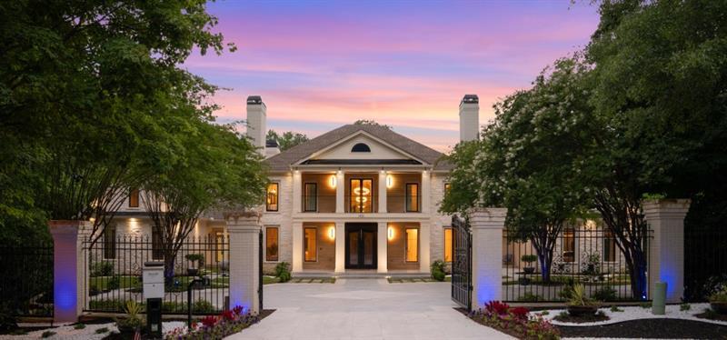 1430 North Harris Ridge Northwest Atlanta, GA 30327 - Photo 2 of 60 a front view of a house with a tree
