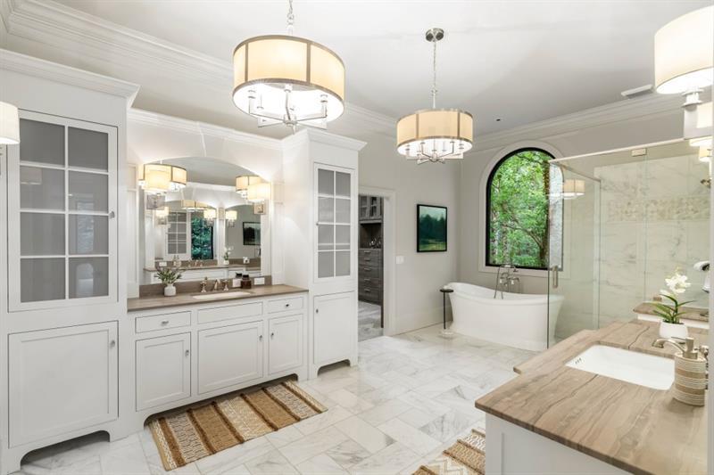 1430 North Harris Ridge Northwest Atlanta, GA 30327 - Photo 22 of 60 a very nice looking dining room with a large window and chandelier