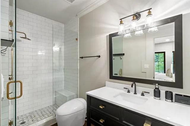 a bathroom with a sink a shower and a bathtub